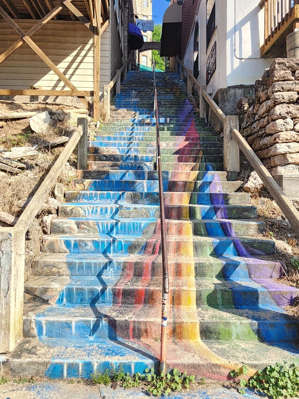 Rainbow-painted public staircase in downtown Eureka Springs